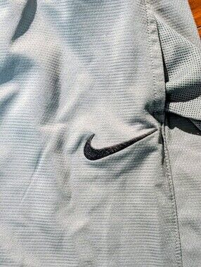 Nike Men’s Light Gray Athletic Shorts with Black Swoosh